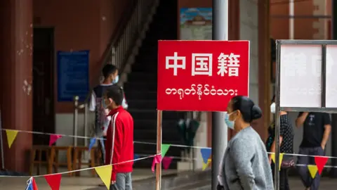 Getty Images Lockdowns and testing drives are routine in Ruili, Yunnan