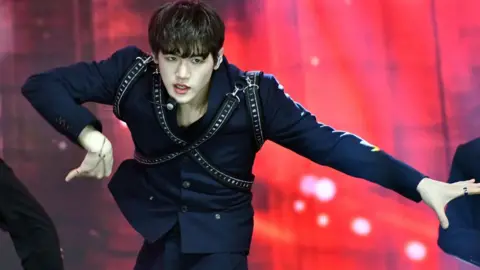 Bain of JUST B dances during a performance of the band on October 27, 2021 in Seoul, South Korea. 