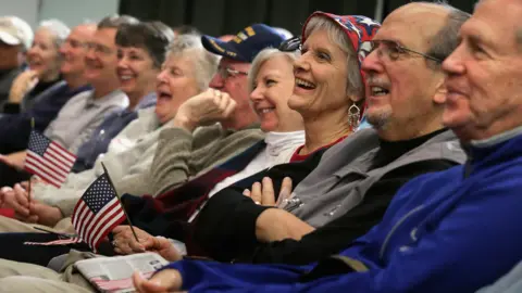 Getty Images Senior citizens listen to Republican presidential candidate Sen. Marco Rubio (R-FL) as he answers questions during a campaign town hall meeting at the Sun City Hilton Head's Magnolia Hall February 11, 2016