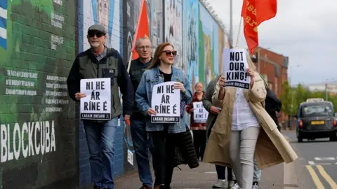 DAMIEN STORAN/Reuters Anti-monarchy protests in west Belfast