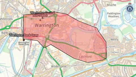 Cheshire Police A map of Warrington with a large section of the town centre - the area covered by the dispersal order - highlighted in red.