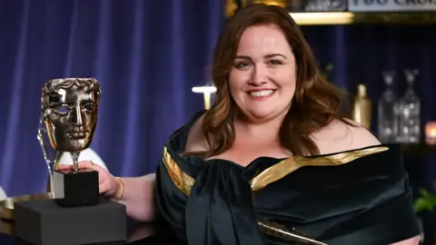 Getty Images Jessica Gunning, winner of the Supporting Actress Award for 'Baby Reindeer', poses in the winners room at The BAFTA Television Awards with P&O Cruises at The Royal Festival Hall on May 11, 2025 in London, England