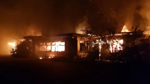 Norfolk Fire & Rescue Service Fire at derelict holiday camp, Hemsby