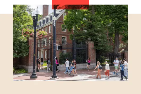 Getty Images People walk through the gate on Harvard Yard at the Harvard University campus 