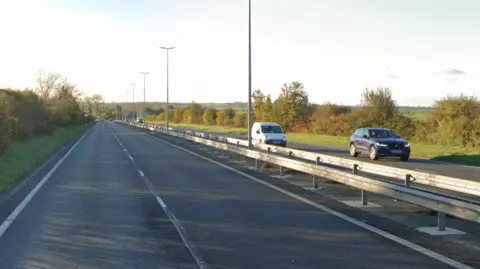 A Google Street image of the westbound A299 near Saint Nicholas-at-Wade. There are cars travelling on one side of the road. 