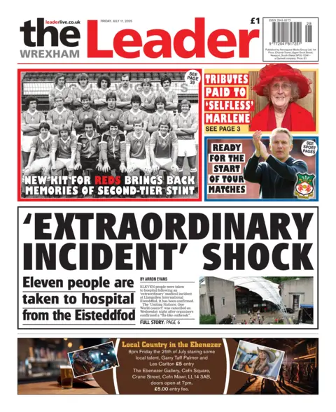 Wrexham Leader Front page of the Wrexham Leader has a picture of two grey buildings next to the headline extraordinary incident shock as eleven people are taked to hospital from the Eisteddfod
