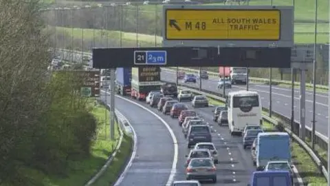 PA Media Traffic on the approach to the Prince of Wales Bridge