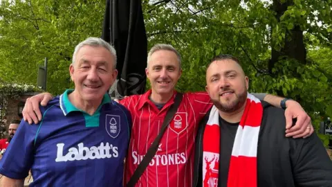 Neil Heath Neil (centre), his dad and a friend