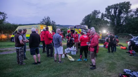 Cleveland Mountain Rescue Team Rescuers de-brief after the rescue