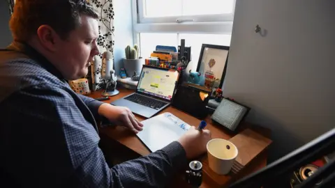 Getty Images Man working from home