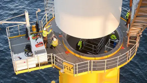 Getty Images Constructing an offshore wind turbine