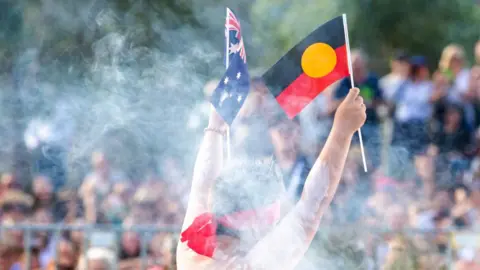 Getty Images A member of the Koomurri dance group performs on Australia Day