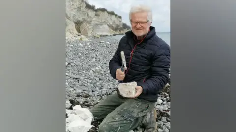 Laila Bennicke Fossil hunter Peter Bennicke at Stevns Cliff where he found the vomit fossil