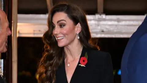 Reuters Catherine, Princess of Wales and Britain's Prince William, Prince of Wales attend "The Royal British Legion Festival of Remembrance" at the Royal Albert Hall in London, Britain,