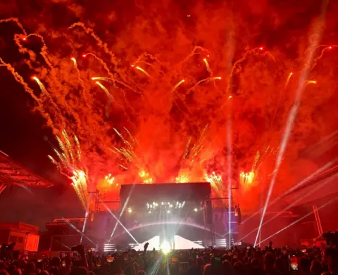 Fireworks go off at the end of the Take That set at Ashton Gate
