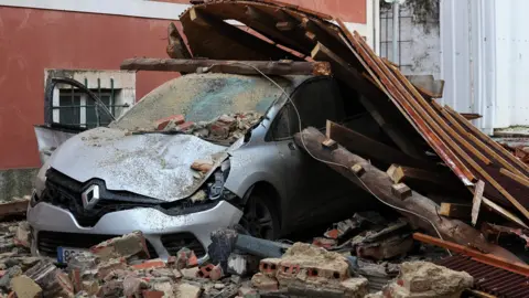 Part of the roof of the old university collapses, damaging several cars, due to the passage of storm Kristin in Figueira da Foz, Portugal, 28 January 2026