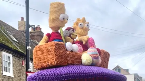 Secret Yarn Bomber Simpsons post box topper