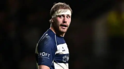 Joe Batley standing on the pitch during a Premiership game this season