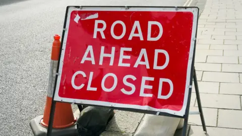 Road Ahead Closed stock photo sign
