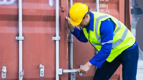 Getty Images Dock worker