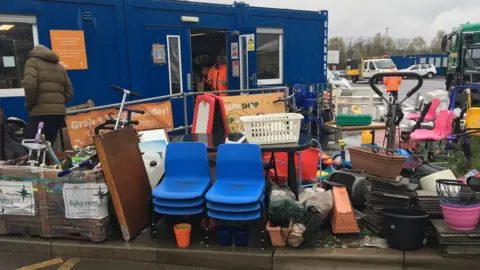 Goods outside a tip shop in Newport