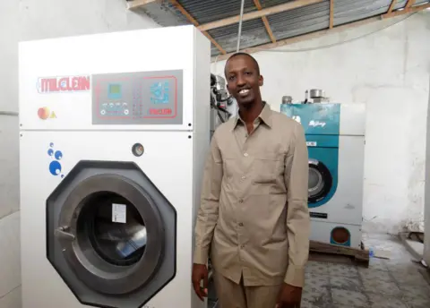 BBC Mohamed Mahamoud Sheikh with a dry-cleaning machine