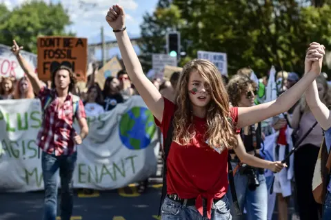 Google Young demonstrators at a 'Fridays for the Future' demonstration in Lausanne, Switzerland