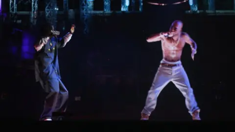 Getty Images Snoop Dogg and Tupac Shakur projection