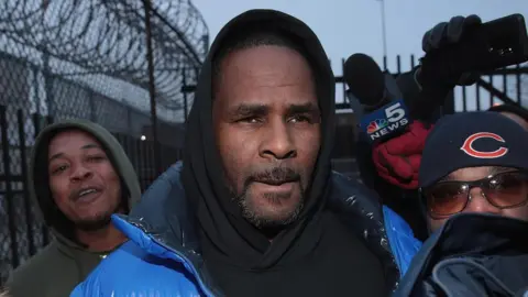 Getty Images R. Kelly leaving a Chicago jail after posting bail in February