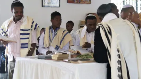 Irums Men wearing Jewish-style clothes