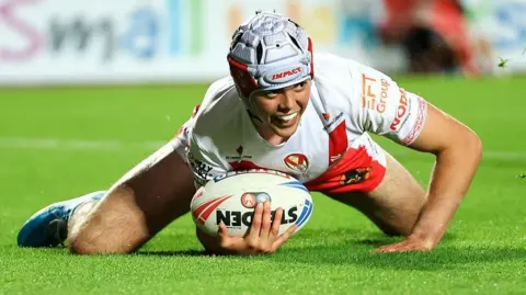 St Helens stand-off George Whitby scores his third try against Catalans Dragons