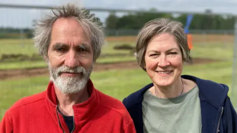 Luke Deal/BBC Angus Wainwright and Helen Geake at Sutton Hoo