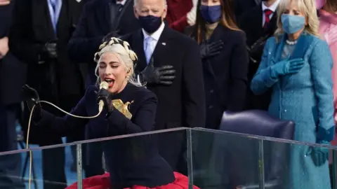 Reuters Lady Gaga performs the Star Spangled Banner at Joe Biden inauguration day