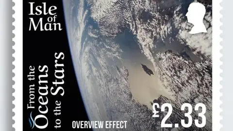 IOM POST OFFICE A stamp featuring a section the Earth from space featuring the Isle of Man. it has Isle of Man and From the Oceans to the Stars.