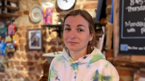 Svetlana working in a West Sussex pub