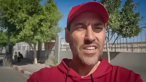 Ahmed Sabra Selfie shot of Sabra in Gaza on the Palestinian side of the Rafah crossing into Egypt on 8 November