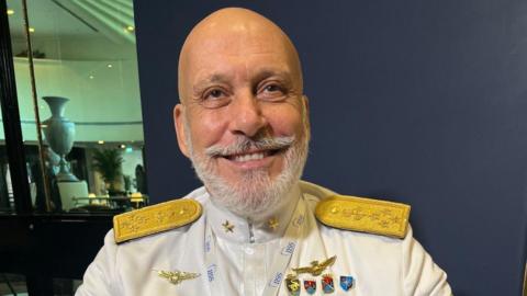 NATO's Commitment to Ukraine: Admiral Cavo Dragone's Call for Peace Talks