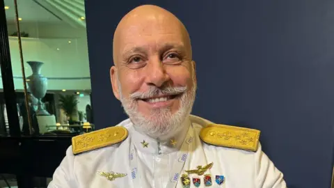 BBC Admiral Giuseppe Cavo Dragone speaks during a BBC interview