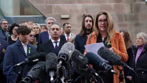 PA Media Bereaved families of the Nottingham attacks making a statement outside Nottingham Crown Court in January 2024