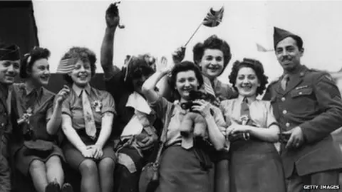 Getty Images American soldiers joining in the VE Day party in 1945