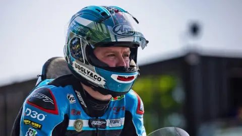 IOM TT Daniel Ingahm in his leather on a bike.