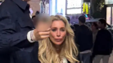 CCTV image showing face of Melissa Rein Lively, a woman with long blonde hair