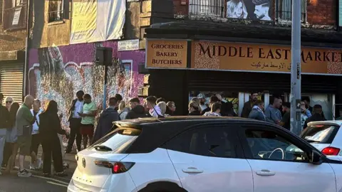 BBC Scene on Falls Road after the attack