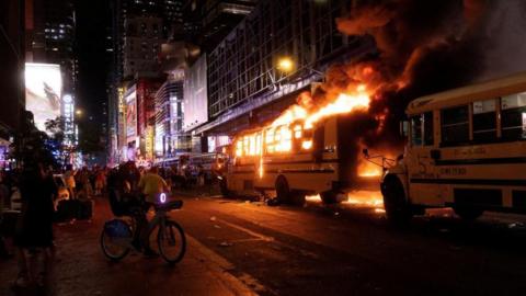 Reuter image of a school bus set alight