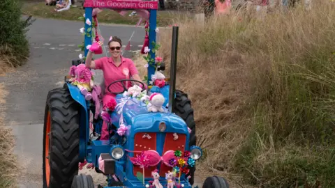 Jonathan Slack Pink Lady on tractor