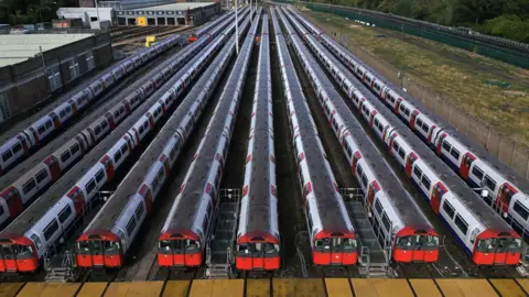 An aerial picture taken with a drone shows London Underground tube trains parked at Cockfosters Depot 