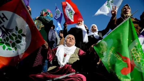 AFP Protesters hold flags of the Peoples" Democratic Party (HDP) during a rally in the Kurdish-majority city of Diyarbakir, south-eastern Turkey, on January 19 , 2019, in support of a jailed lawmaker who has been on hunger strike for more than two months.