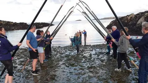 Bull Bay Community Boat House Fundraiser group Di being welcomed back