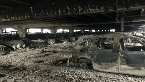 Merseyside Fire and Rescue Service Vehicles damaged in car park fire