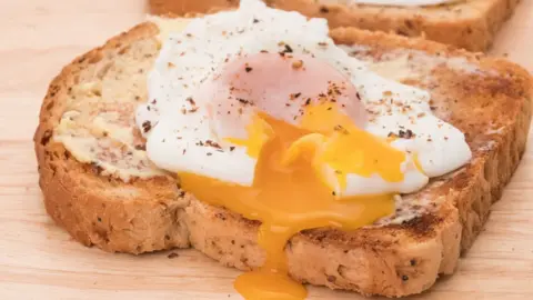 Getty Images A fried egg on a piece of wholemeal toast